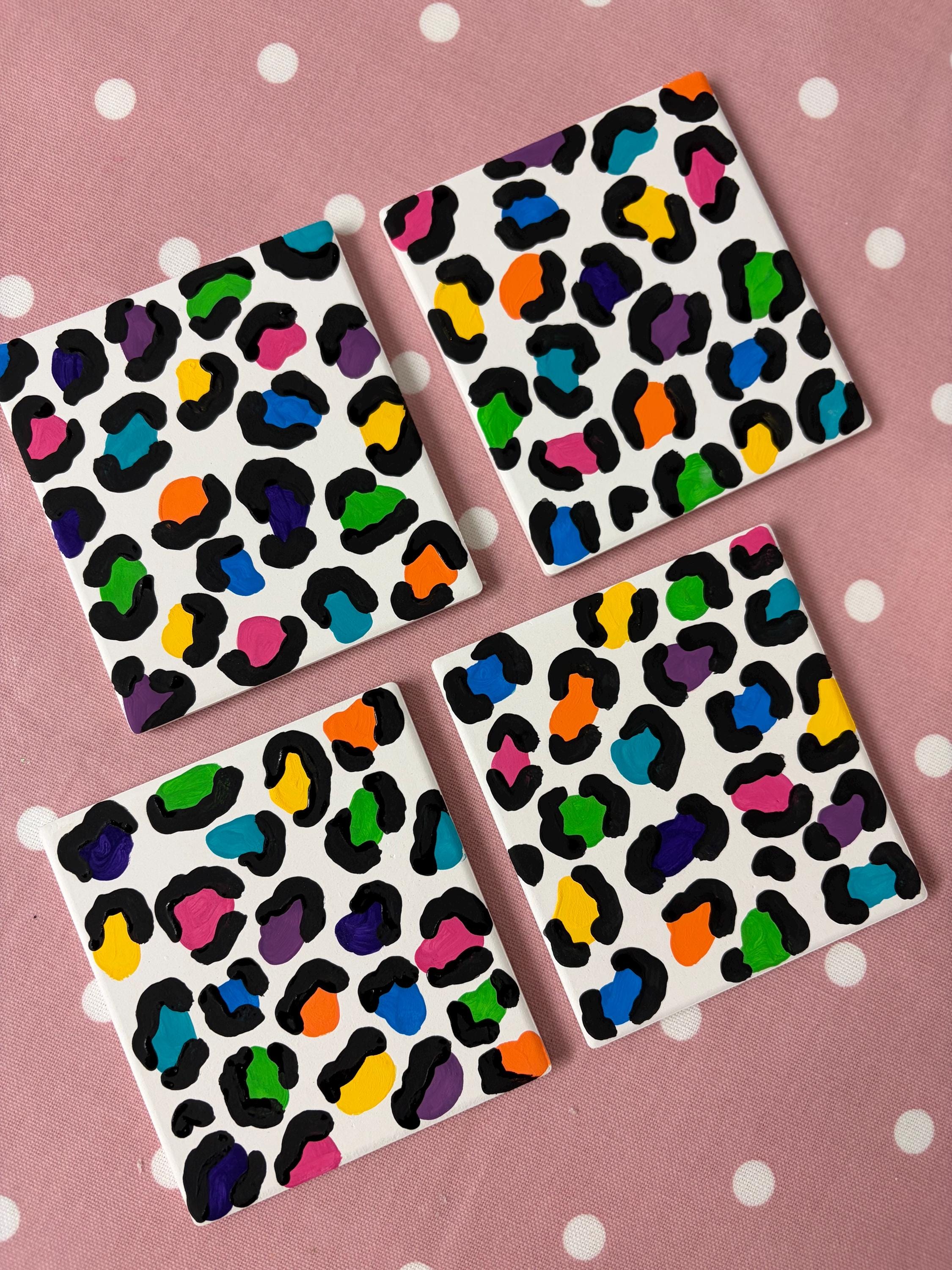 Bright rainbow leopard print hand painted ceramic coasters.