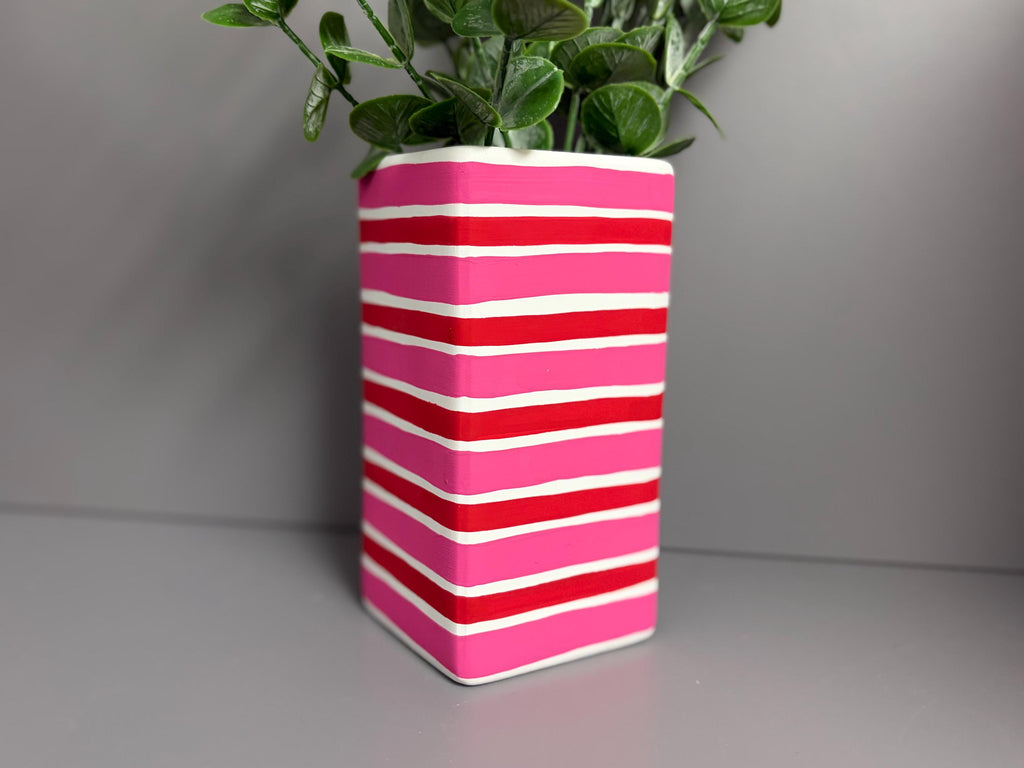 Pink and red stripe hand painted  ceramic vase.