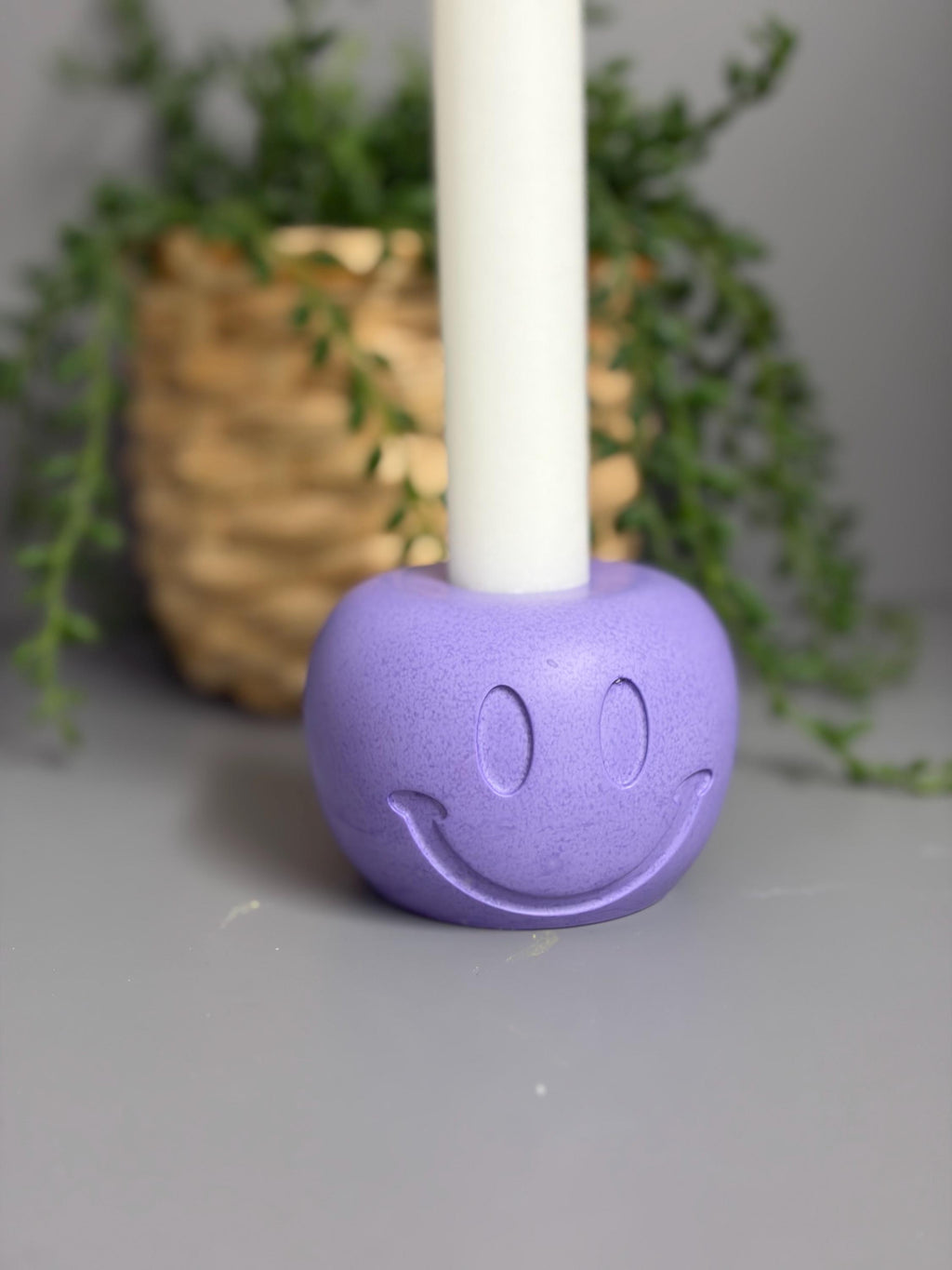 Handmade Jesmonite Smiley Face candle holder.