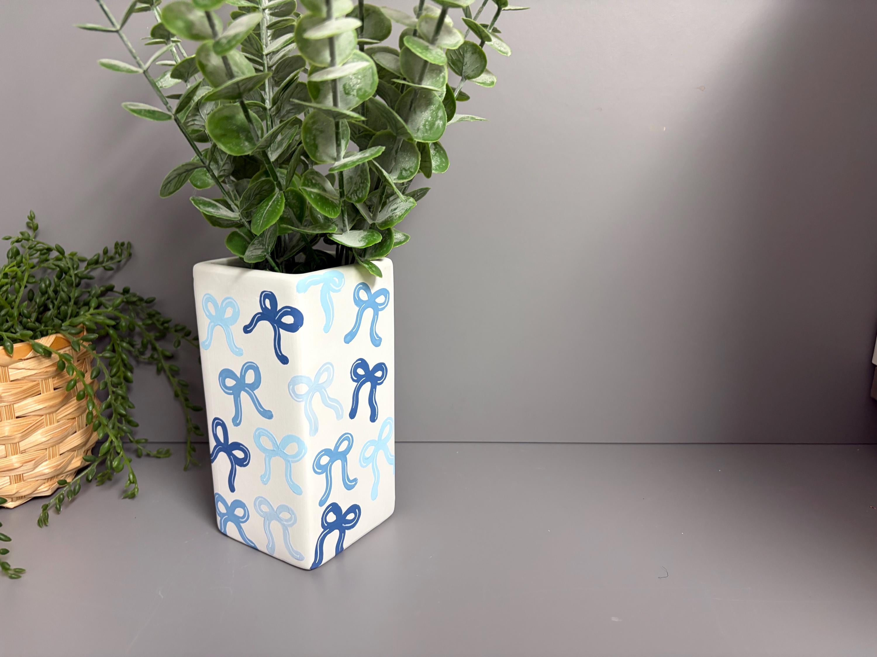 Shades of blue bows hand painted ceramic vase