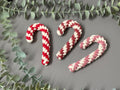 Christmas macrame candy cane decorations, candy cane baubles, macrame decorations.