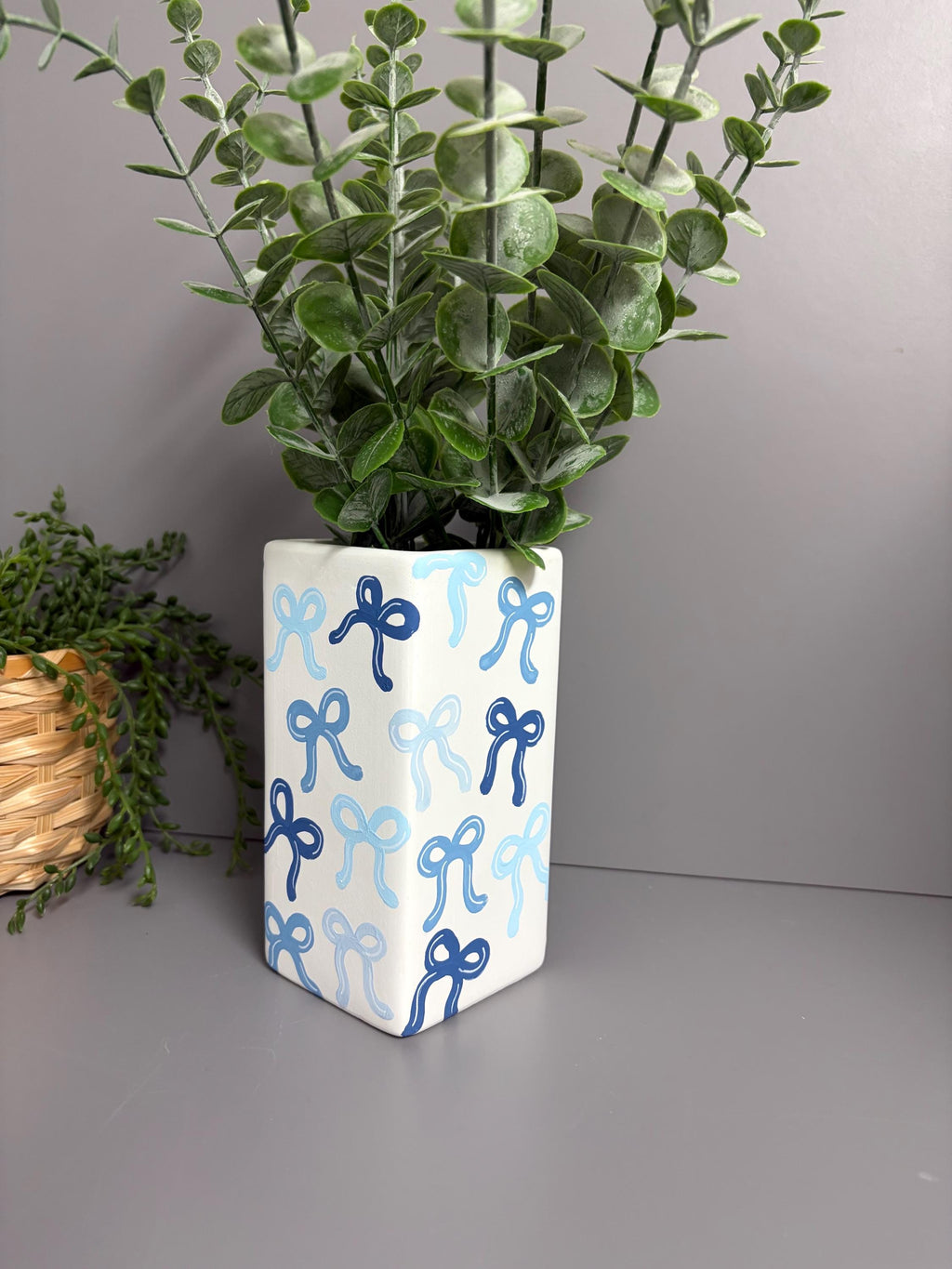 Shades of blue bows hand painted ceramic vase