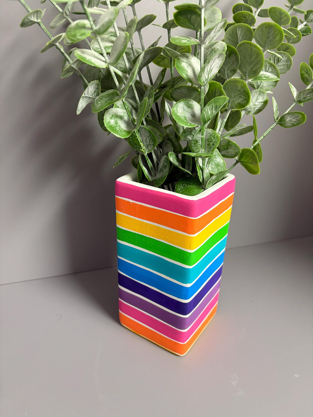 Bright rainbow strip hand painted ceramic vase