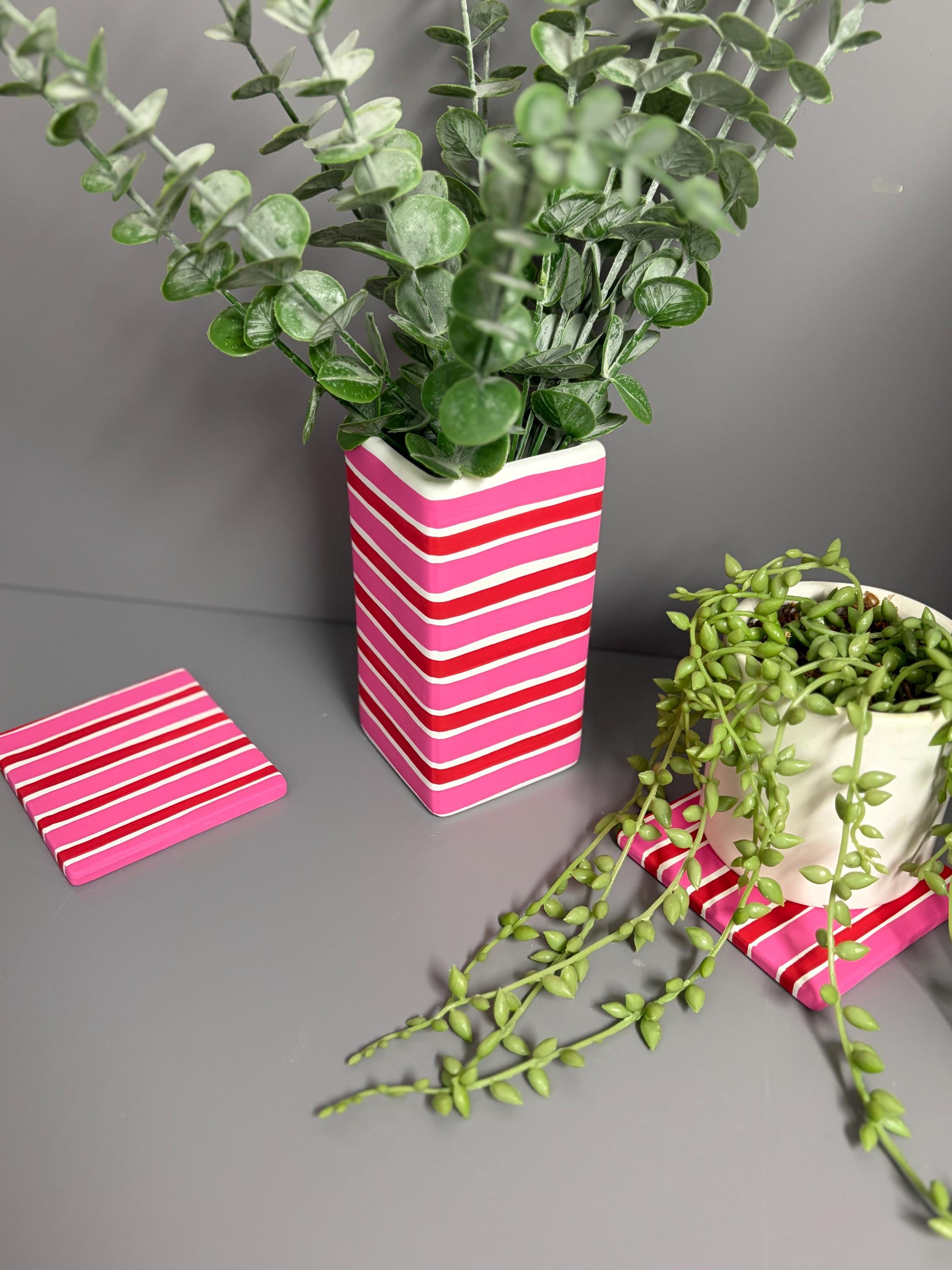 Pink and red stripe hand painted ceramic coasters.