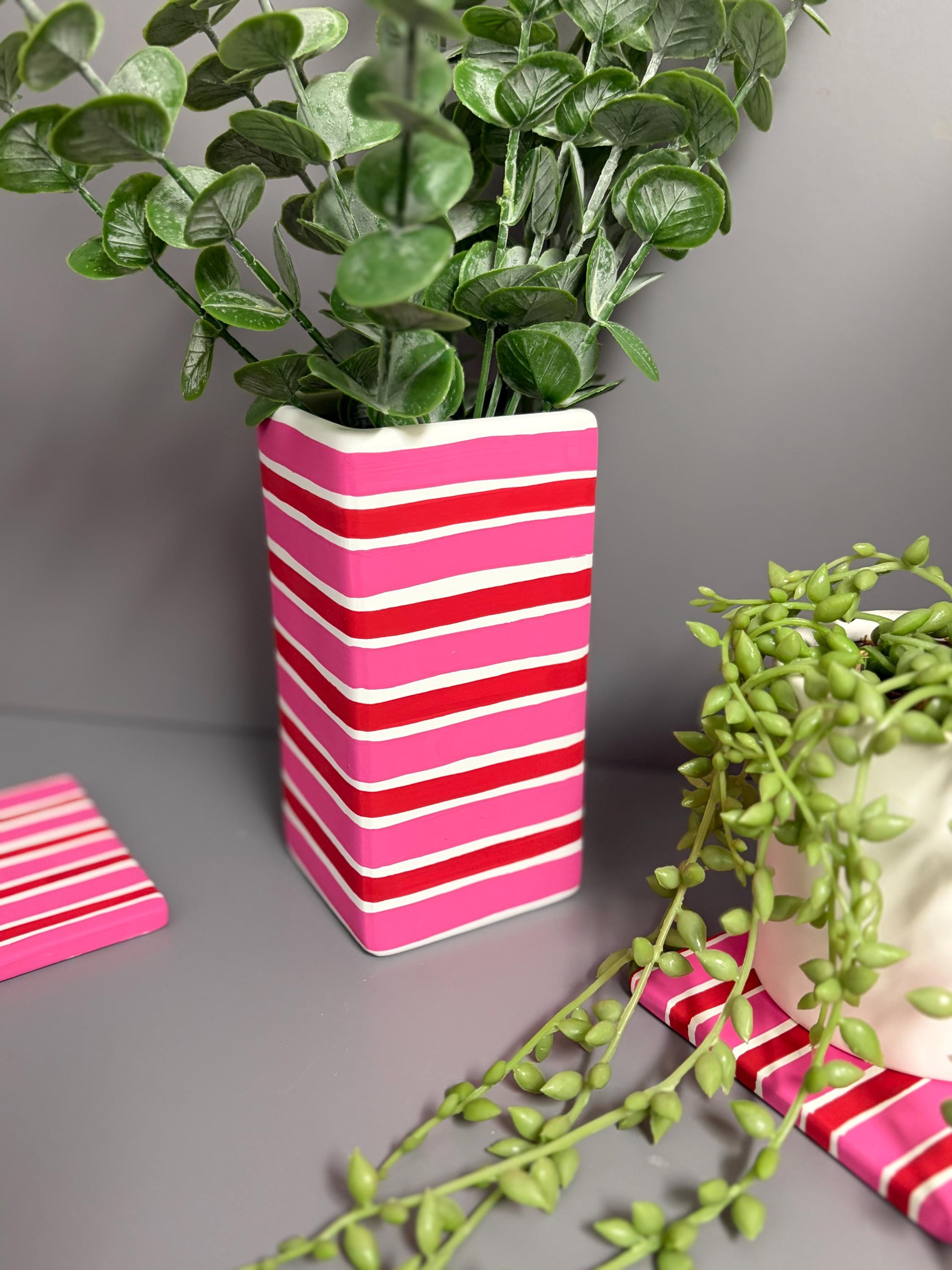 Pink and red stripe hand painted  ceramic vase.