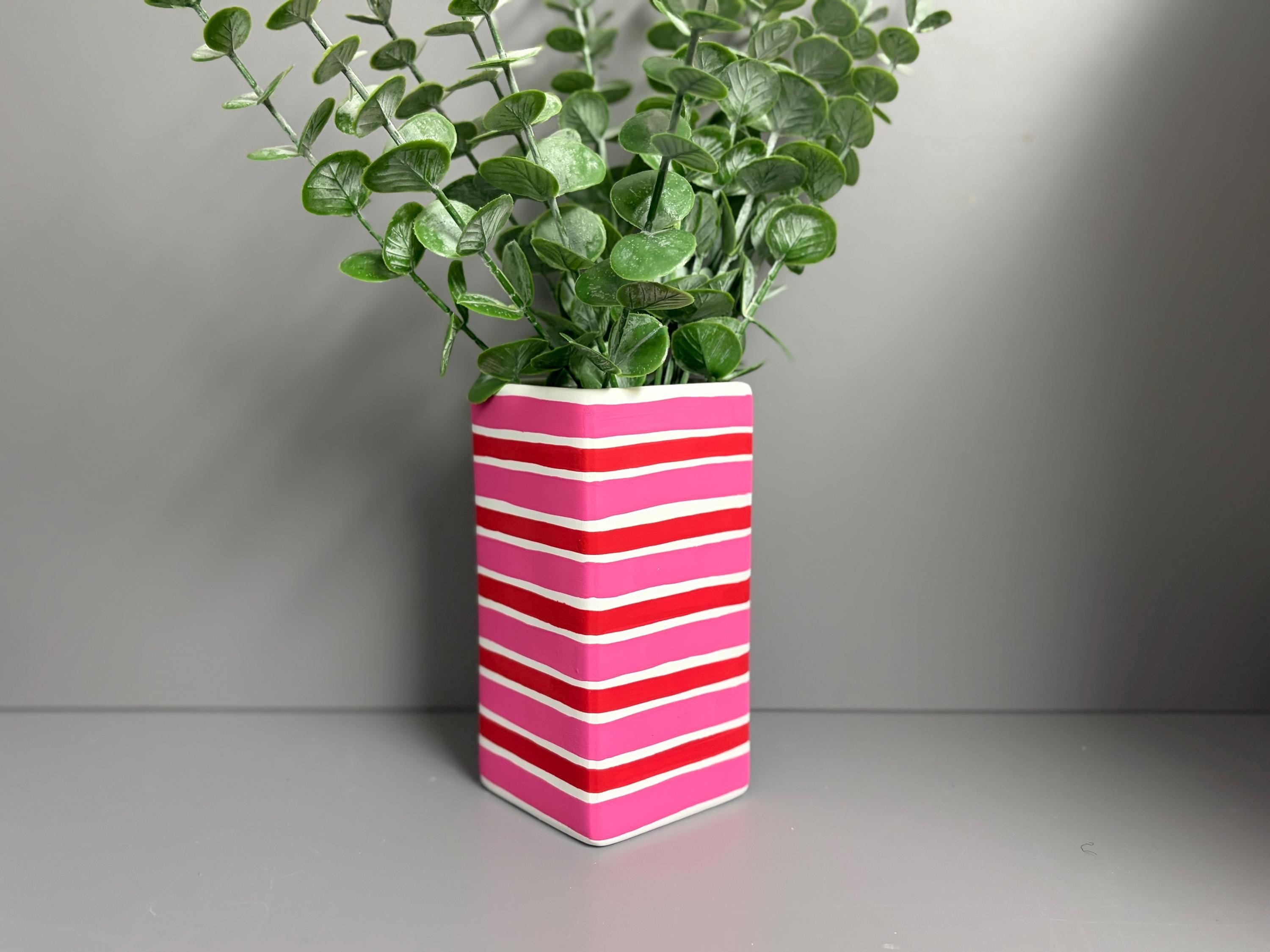 Pink and red stripe hand painted  ceramic vase.