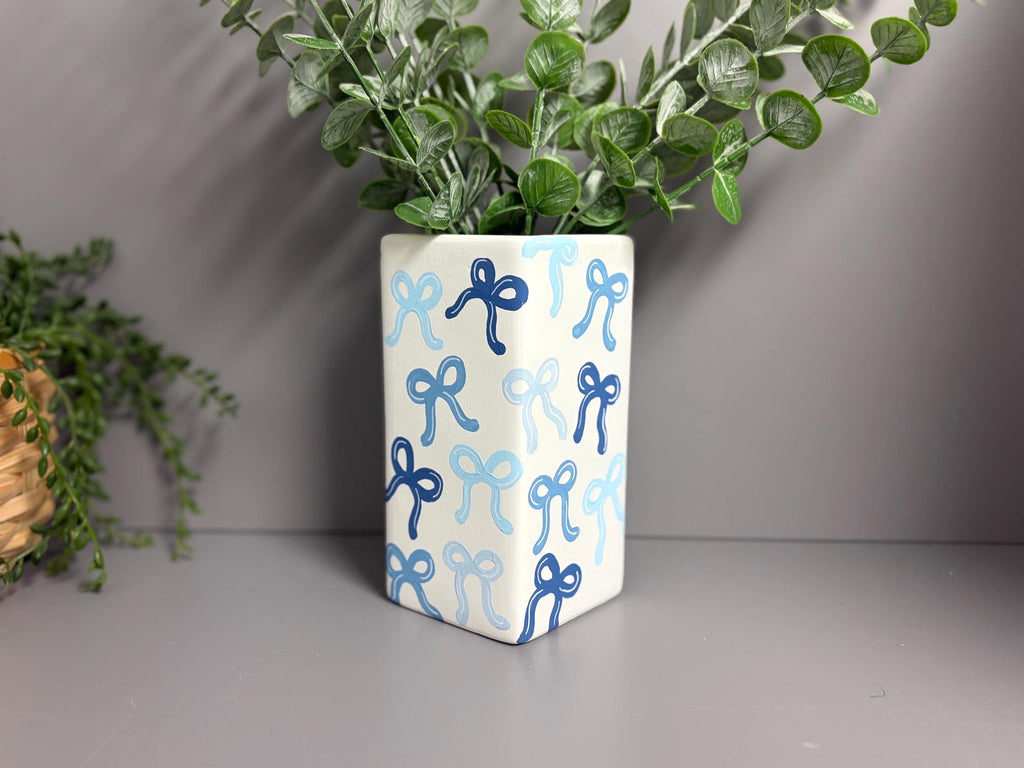 Shades of blue bows hand painted ceramic vase