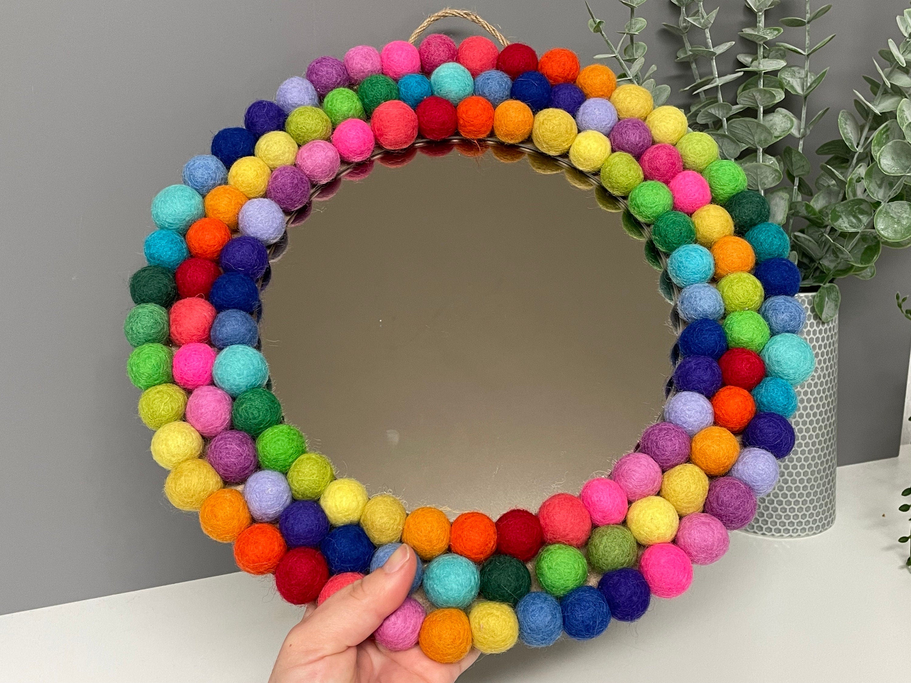 Medium Circular Hanging Pom Pom mirror, rainbow pom Poms, playroom decor.
