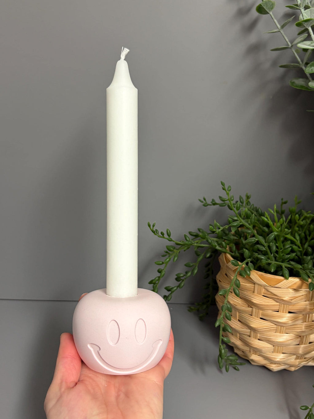 Handmade Jesmonite Smiley Face candle holder.