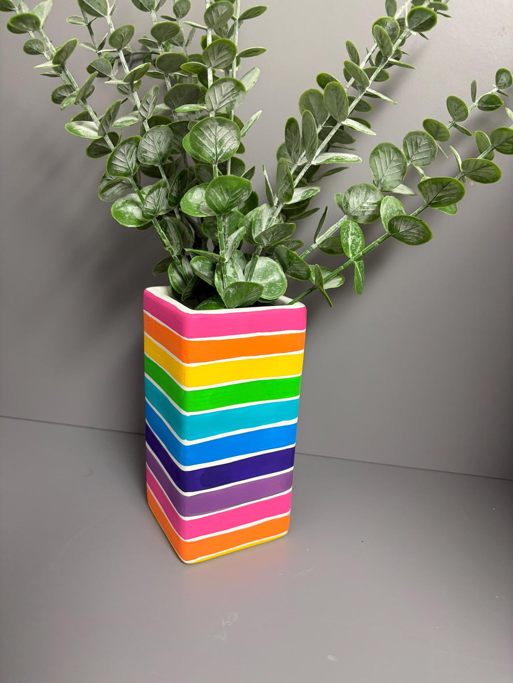 Bright rainbow strip hand painted ceramic vase