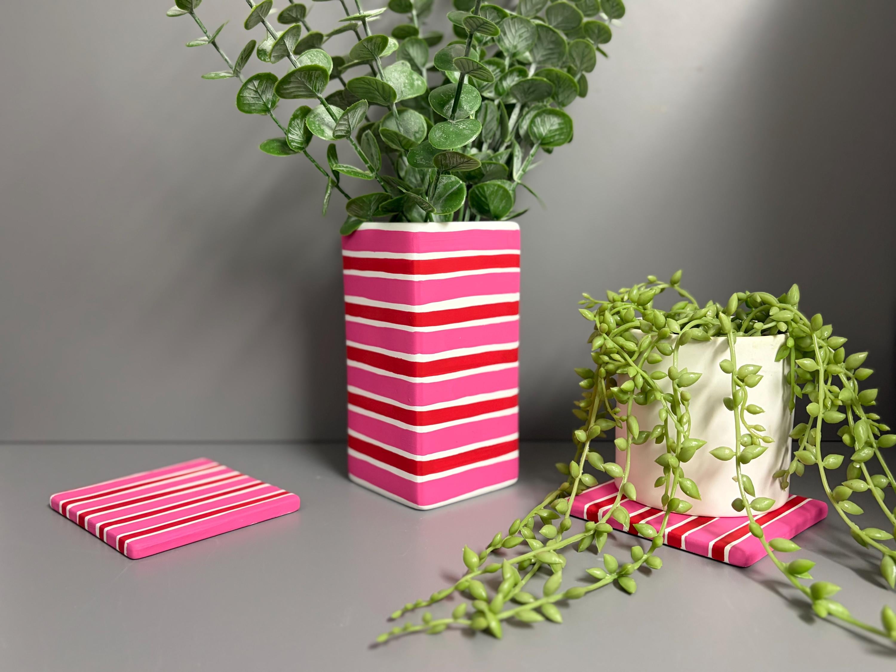 Pink and red stripe hand painted  ceramic vase.