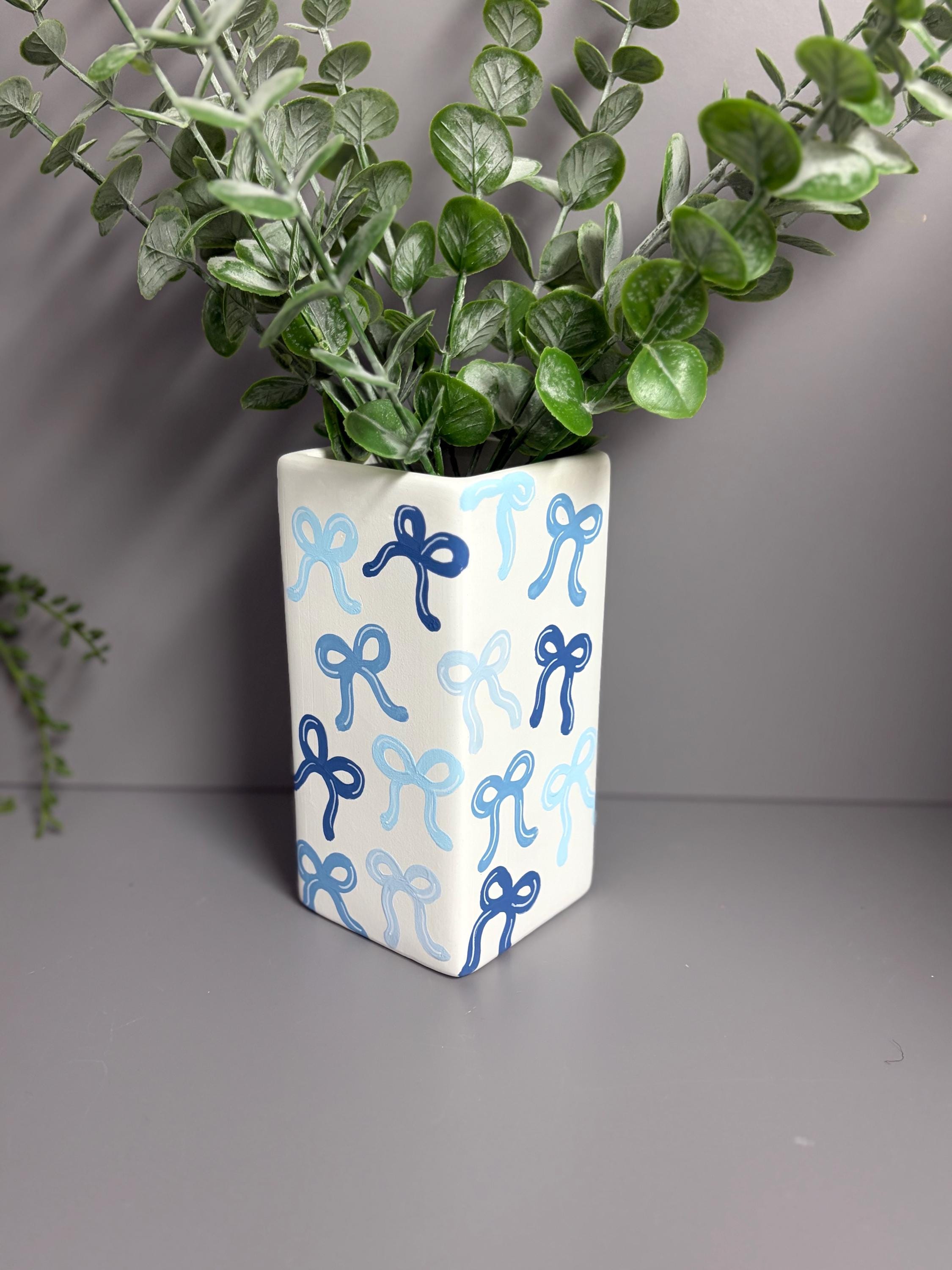 Shades of blue bows hand painted ceramic vase
