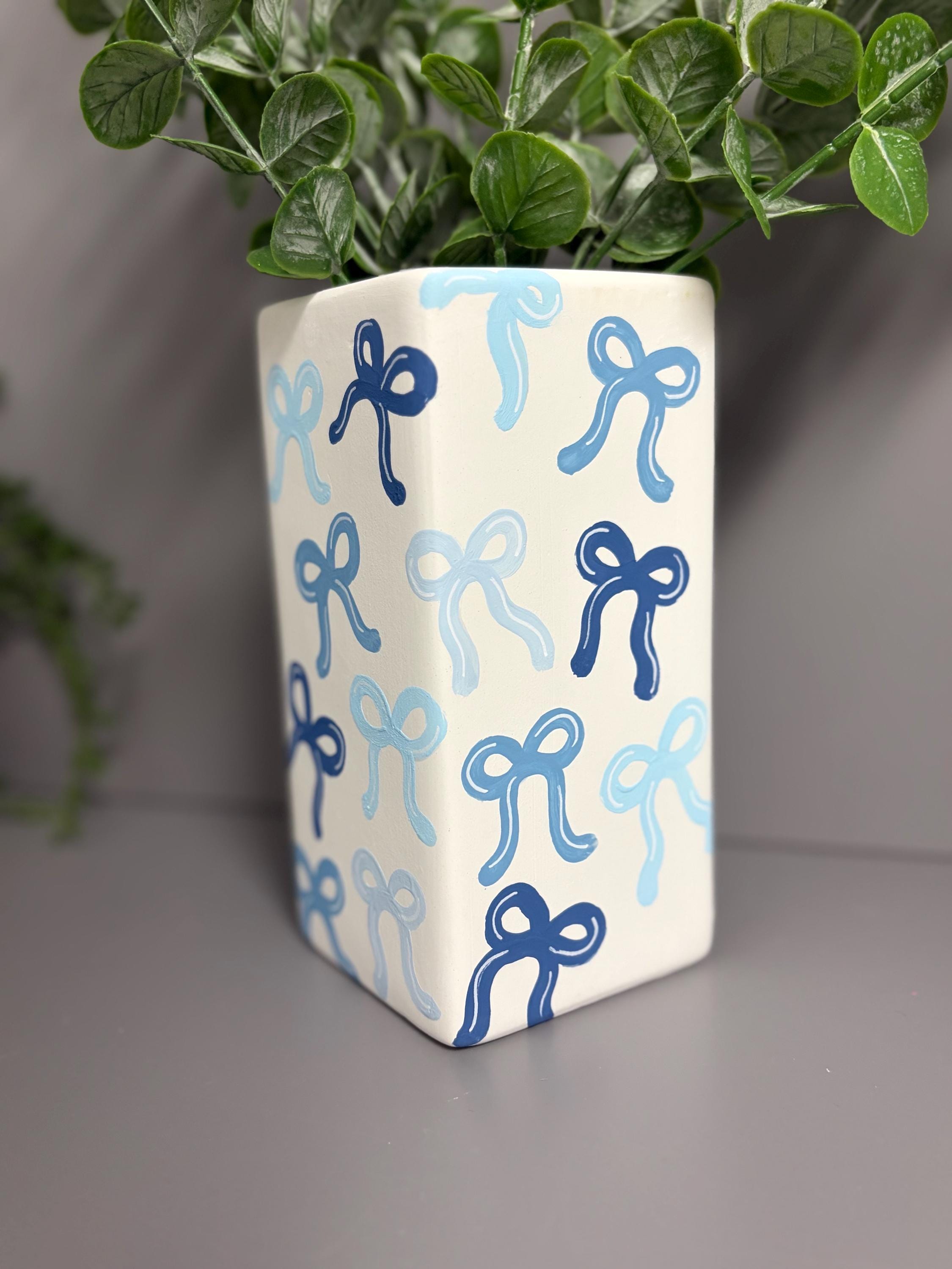 Shades of blue bows hand painted ceramic vase