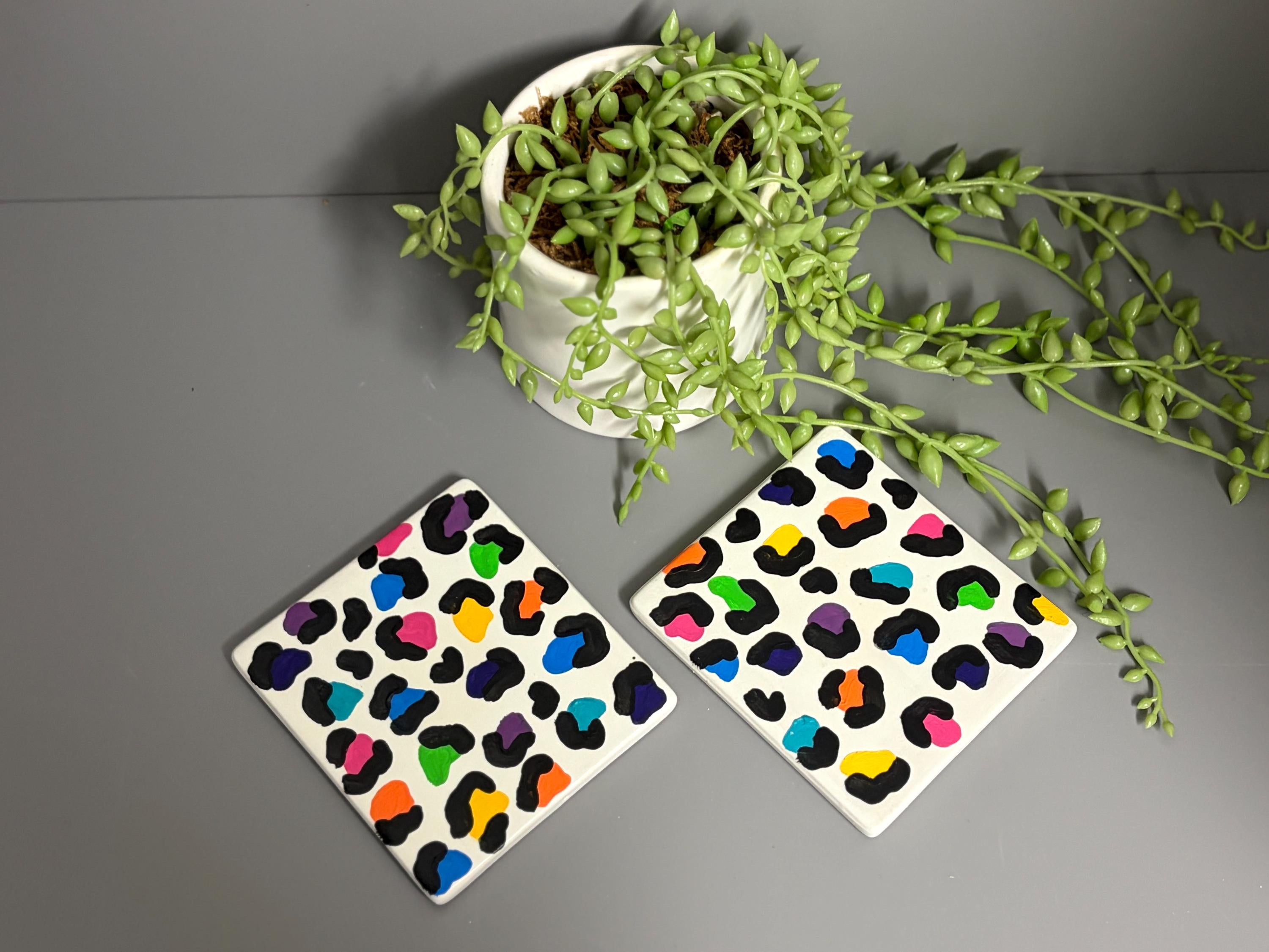 Bright rainbow leopard print hand painted ceramic coasters.
