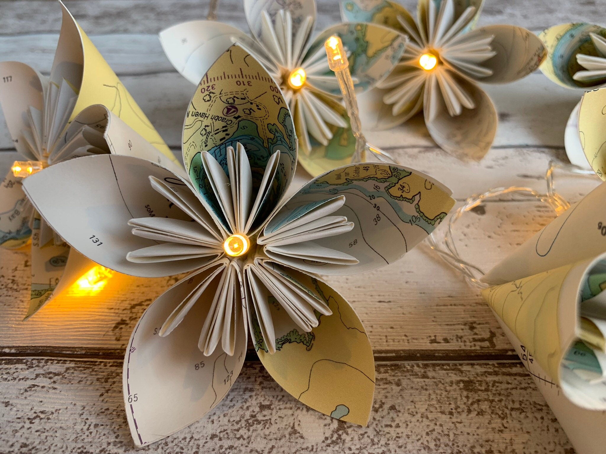 Sea chart paper flower fairy lights, recycled sea charts.