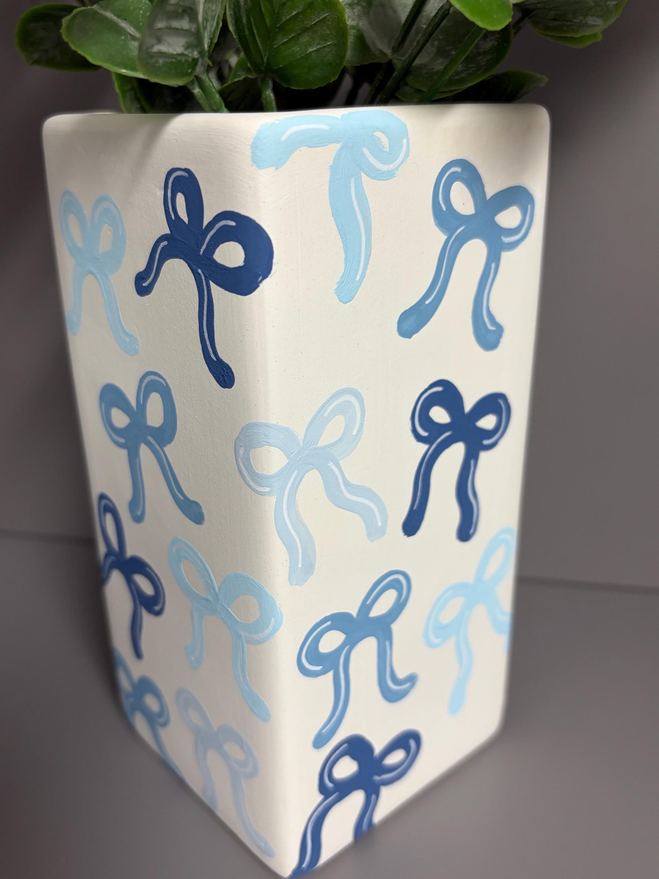 Shades of blue bows hand painted ceramic vase