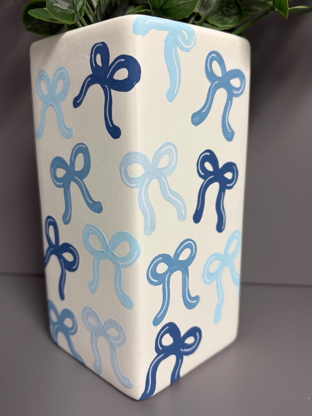 Shades of blue bows hand painted ceramic vase