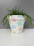 Handpainted terracotta plant pot for house plants, pastel coloured flowers.