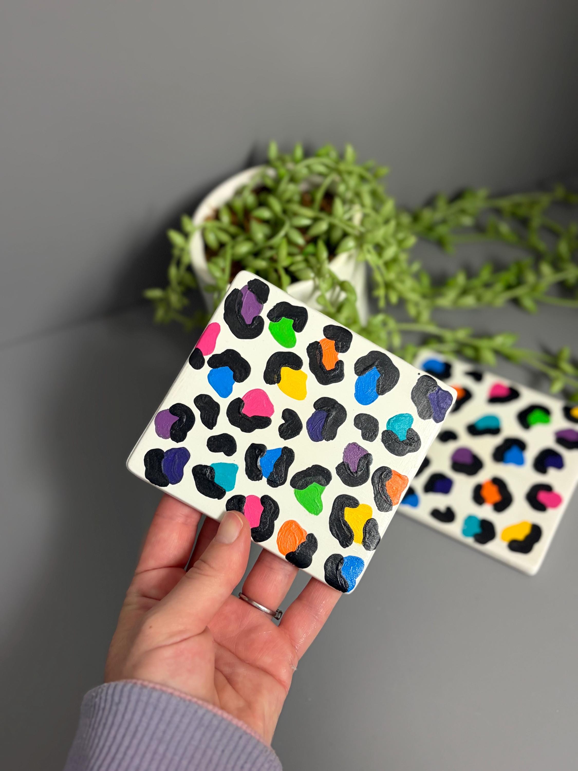 Bright rainbow leopard print hand painted ceramic coasters.
