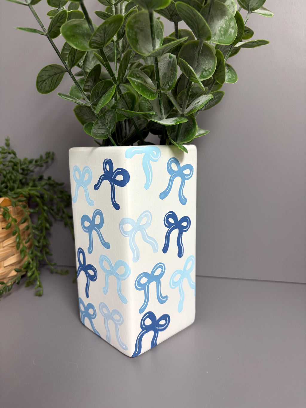 Shades of blue bows hand painted ceramic vase